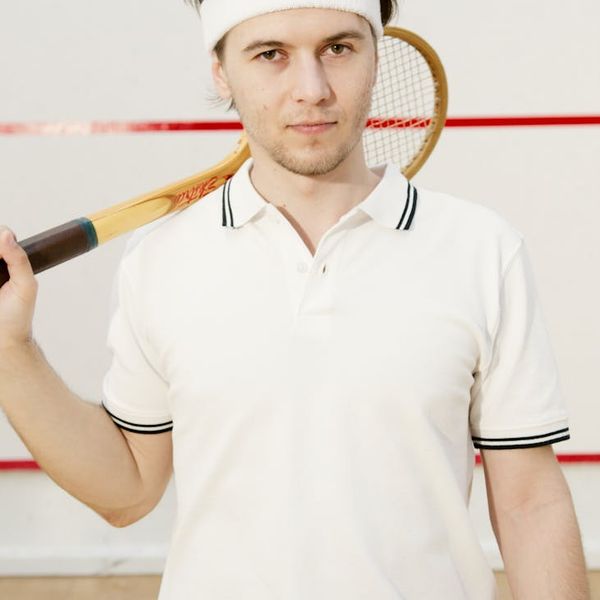 Man looking determined and focused during a workout session.